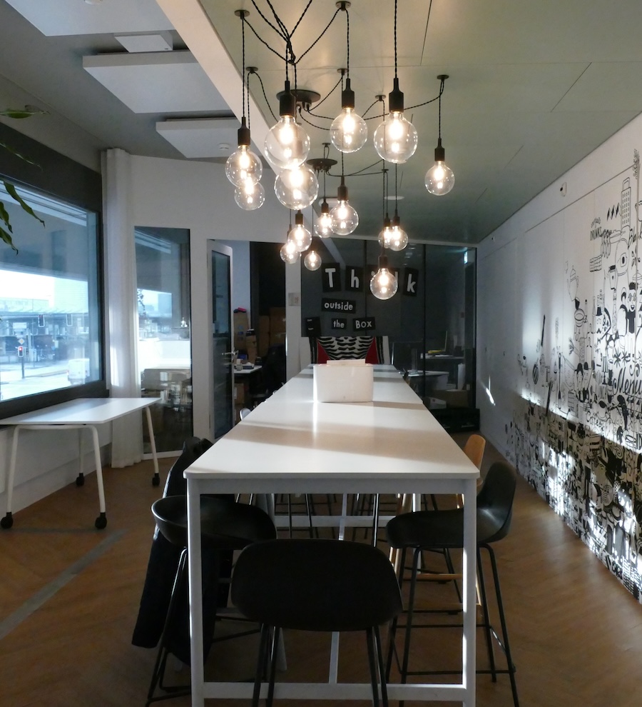 Common area and kitchen at Tenity’s Zurich coworking space — lounge and collaboration zone for professionals